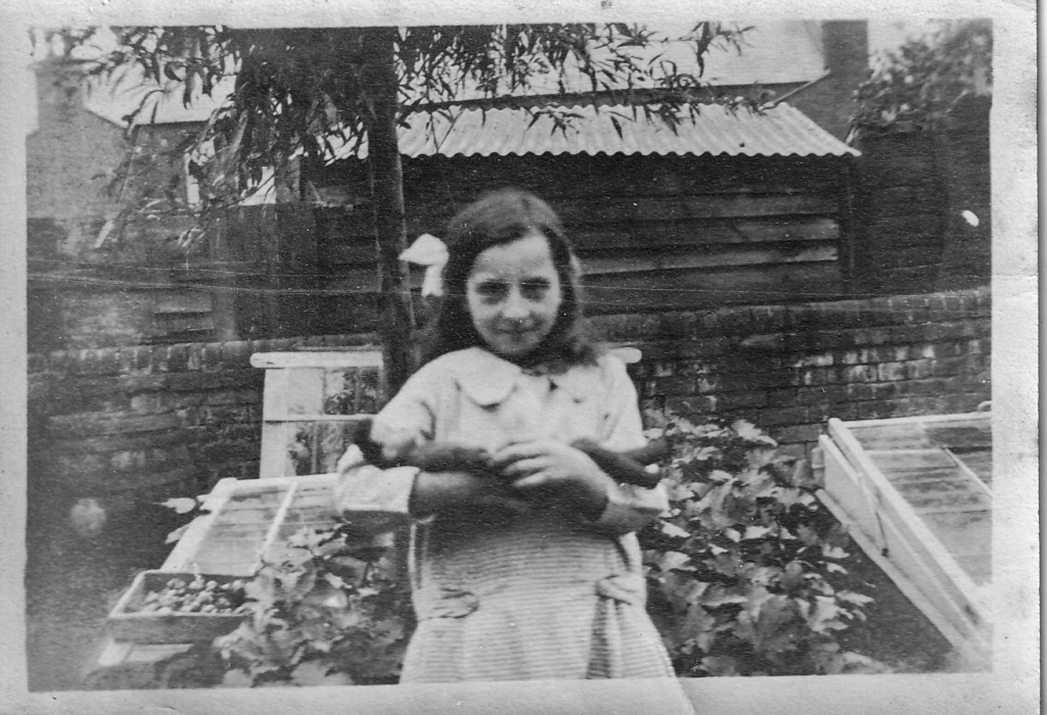 Girl holding a doll?